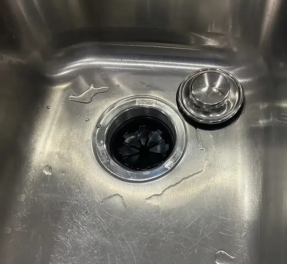 Clogged kitchen sink drain repair service in Pittsburgh, PA by Taggart Plumbing