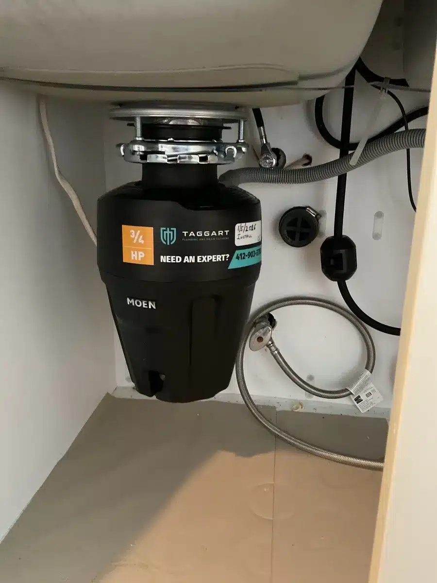 Garbage disposal installed under a sink in Pittsburgh, PA