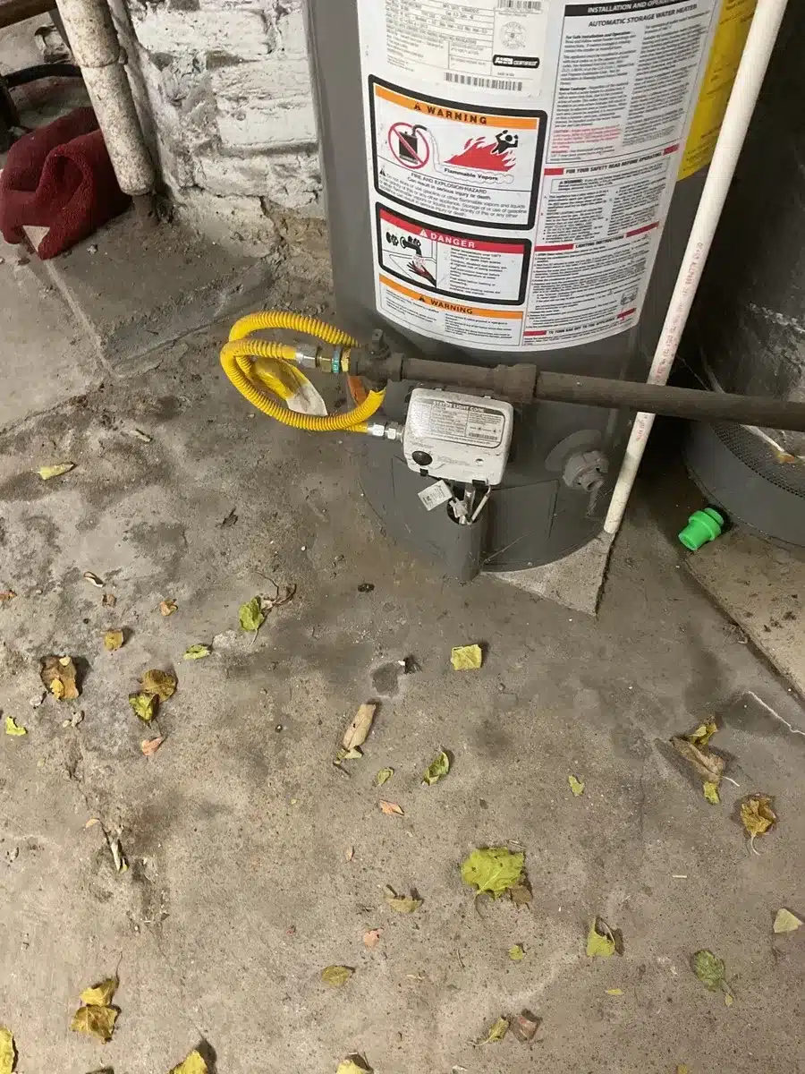 Gas flex connector and shutoff at a water heater base in Pittsburgh, PA