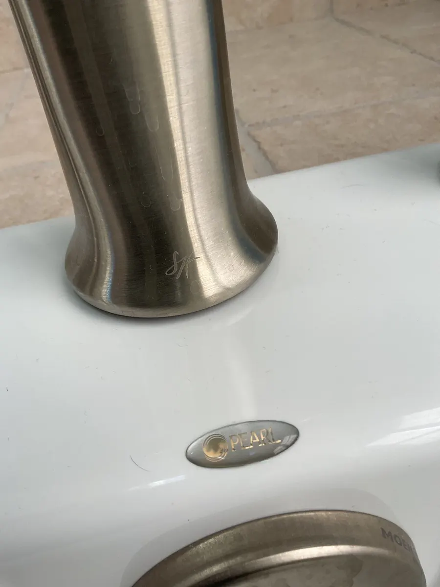 Brushed nickel faucet base close-up in Pittsburgh, PA