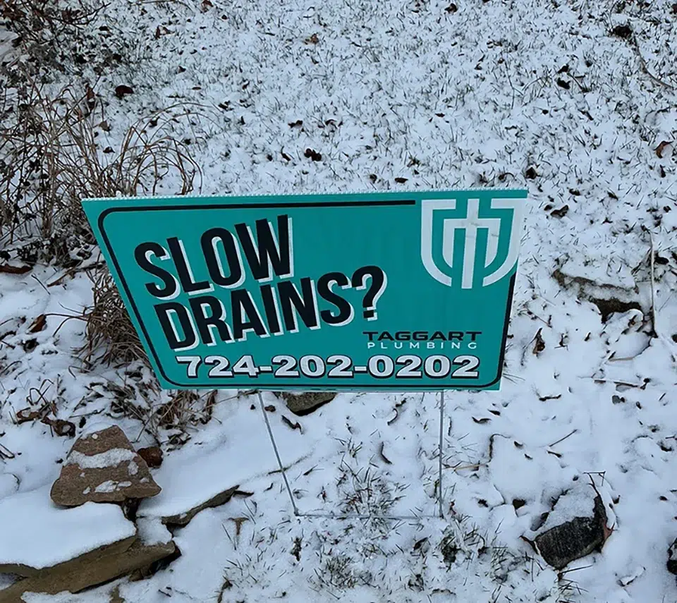 Slow drain yard sign from Taggart Plumbing in Pittsburgh, PA