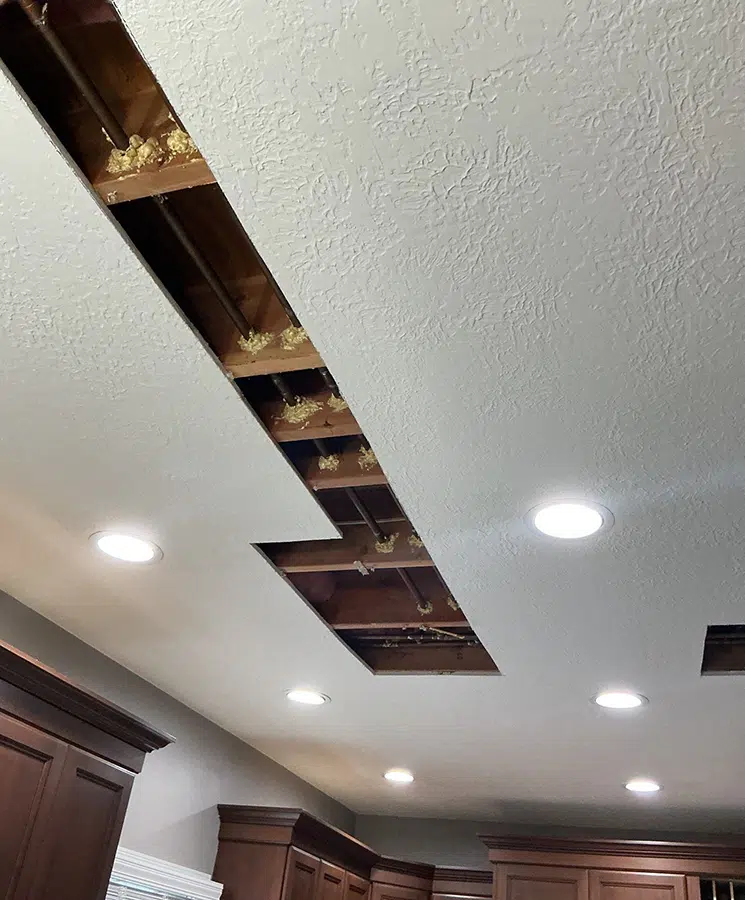 Ceiling access opened to reach kitchen supply piping in Pittsburgh, PA