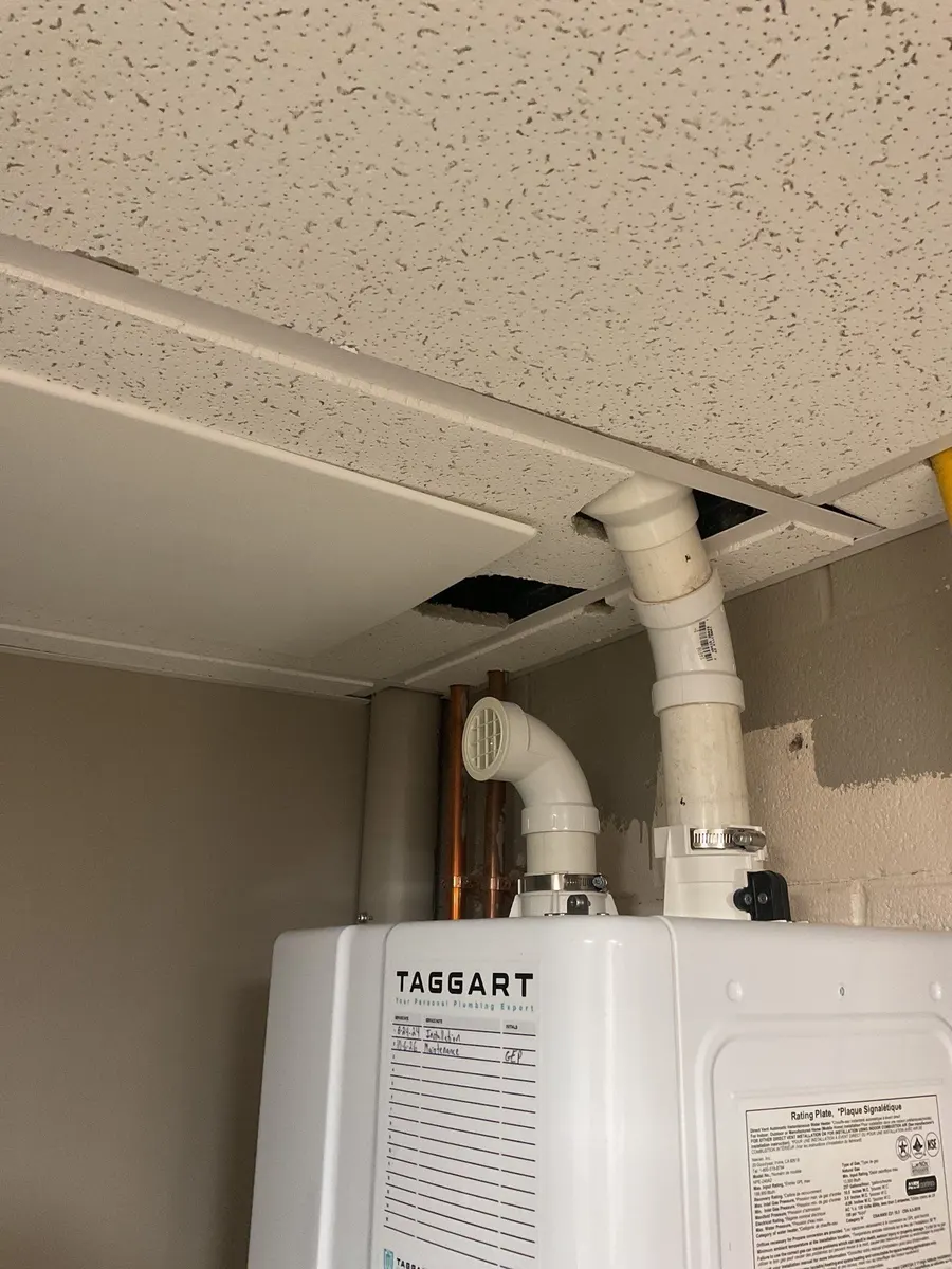 Tankless water heater installed in a finished basement in Pittsburgh, PA