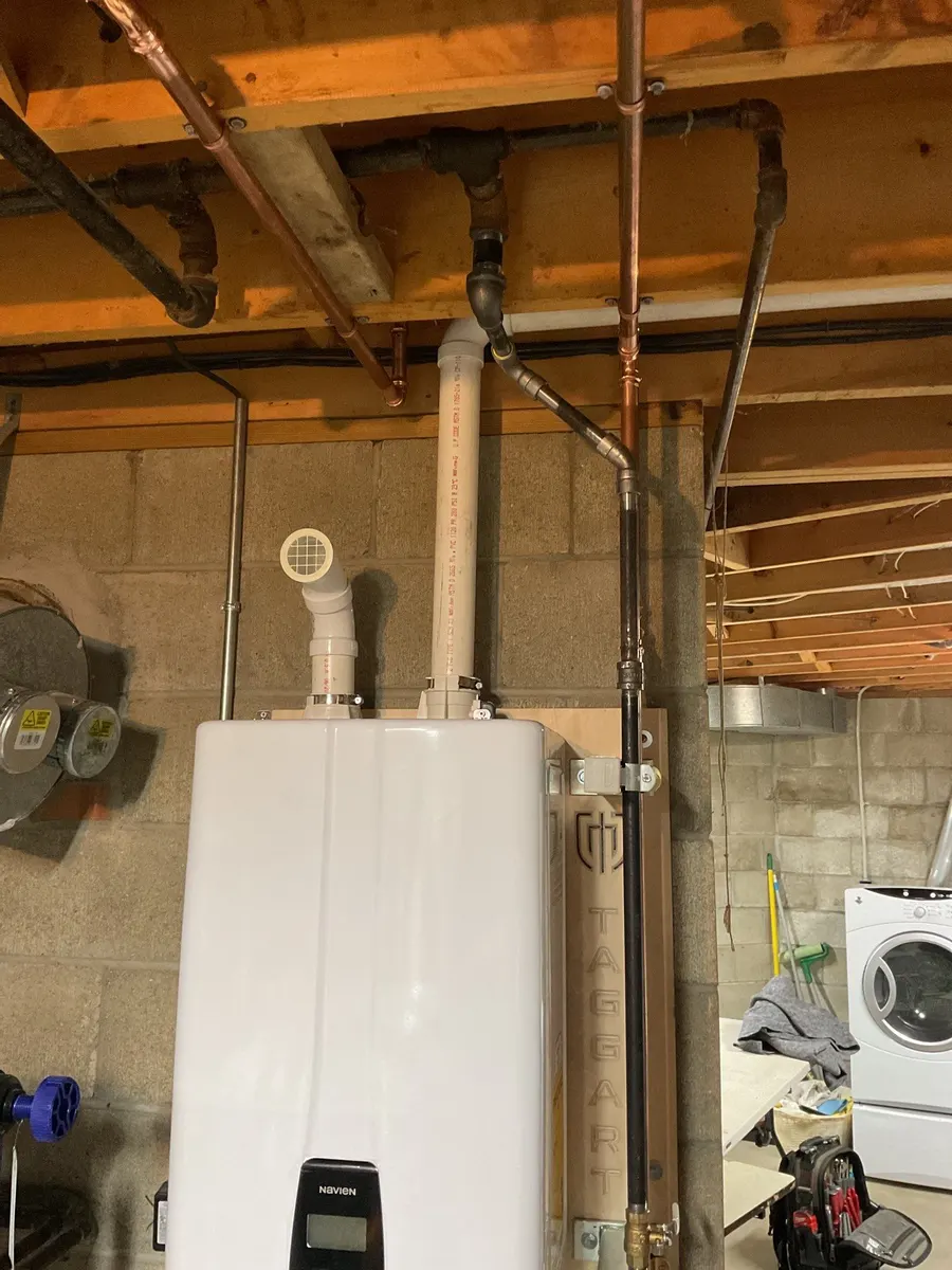 Tankless water heater with PVC venting in a Pittsburgh, PA basement