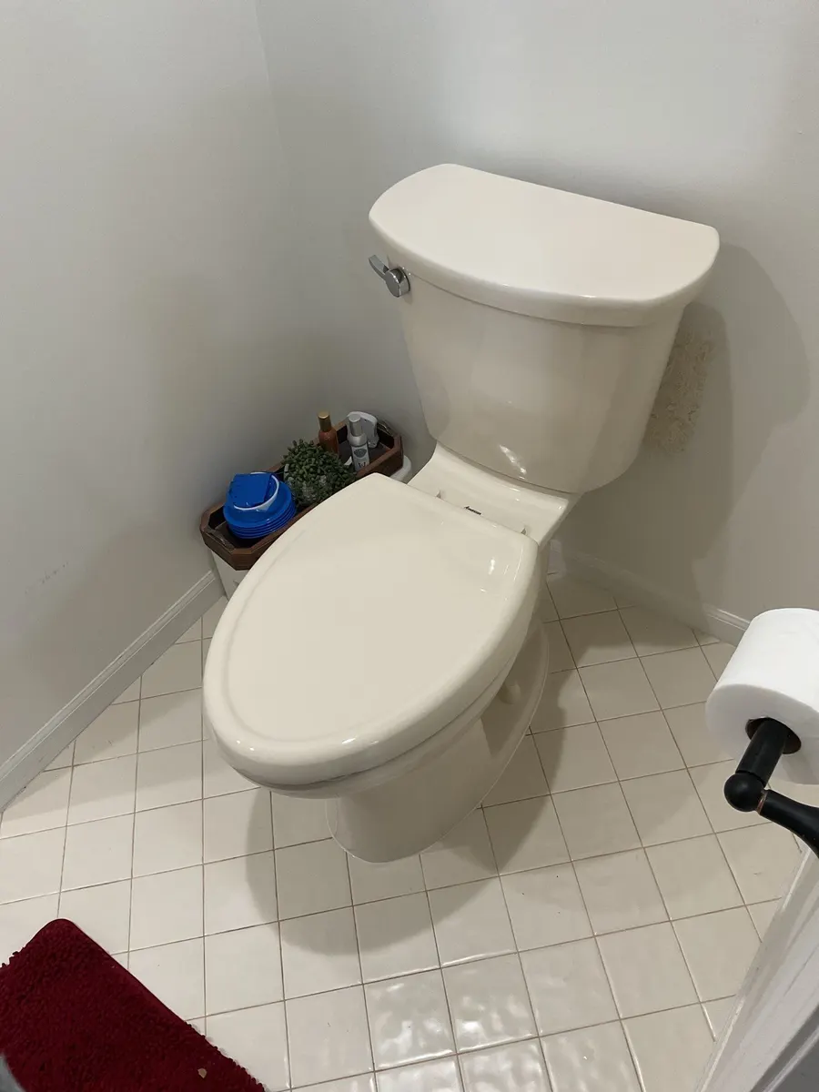 Toilet replacement in a tiled bathroom in Pittsburgh, PA