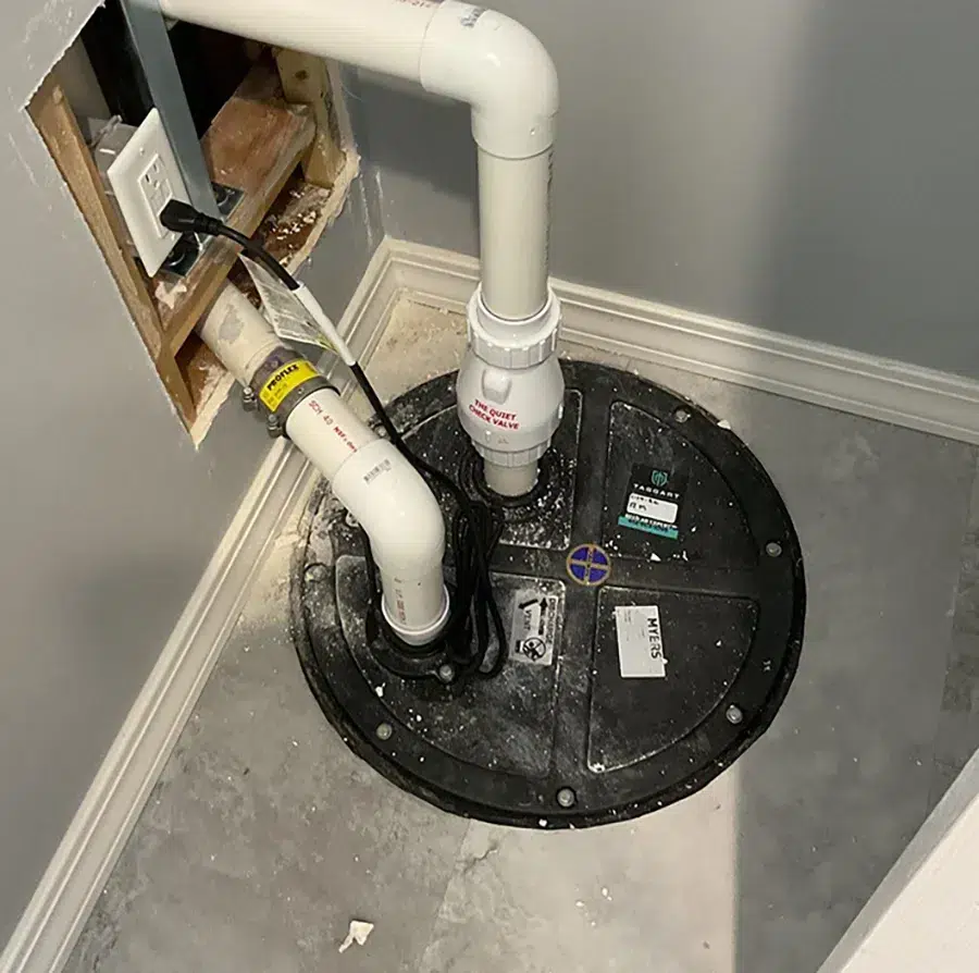 Basement sump pump installation in Pittsburgh, PA by Taggart Plumbing
