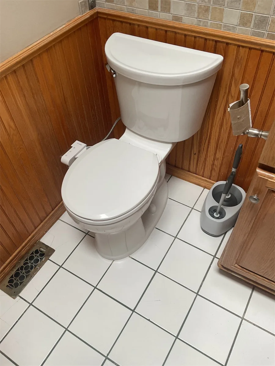 New toilet installed on white tile flooring in Pittsburgh, PA