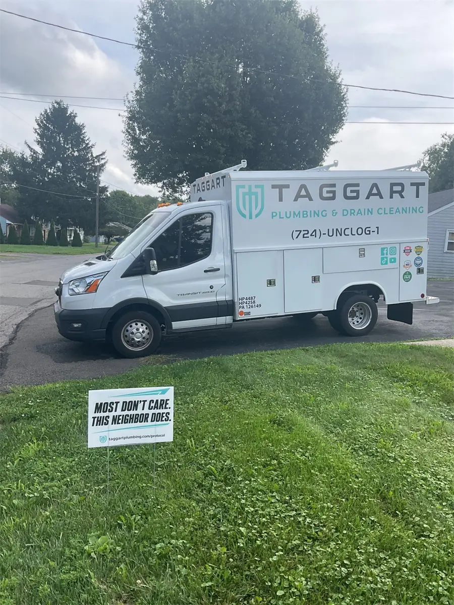 Taggart Plumbing service van parked at a job site in Pittsburgh, PA
