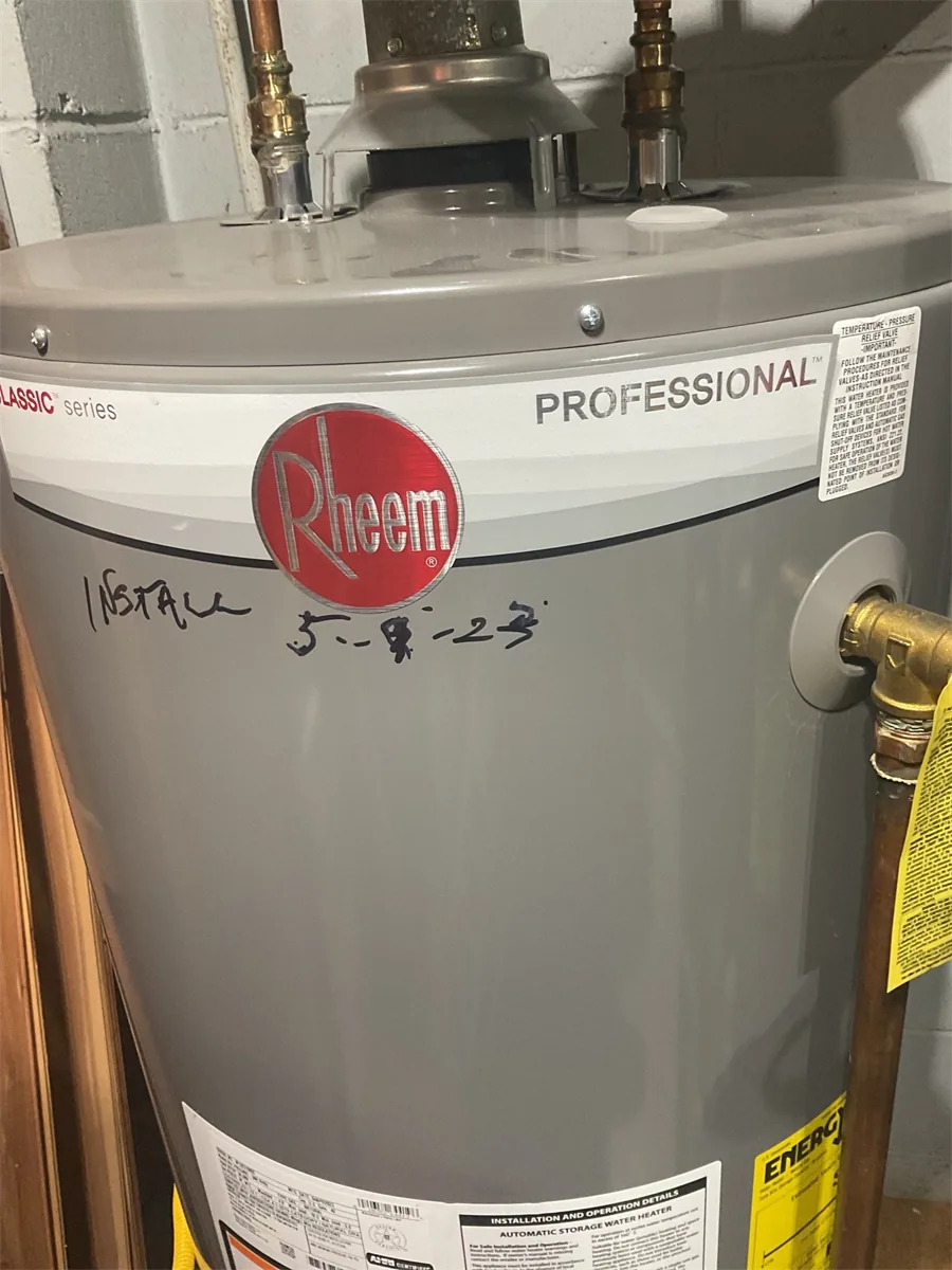 Rheem Professional gas water heater installed in a Pittsburgh, PA basement