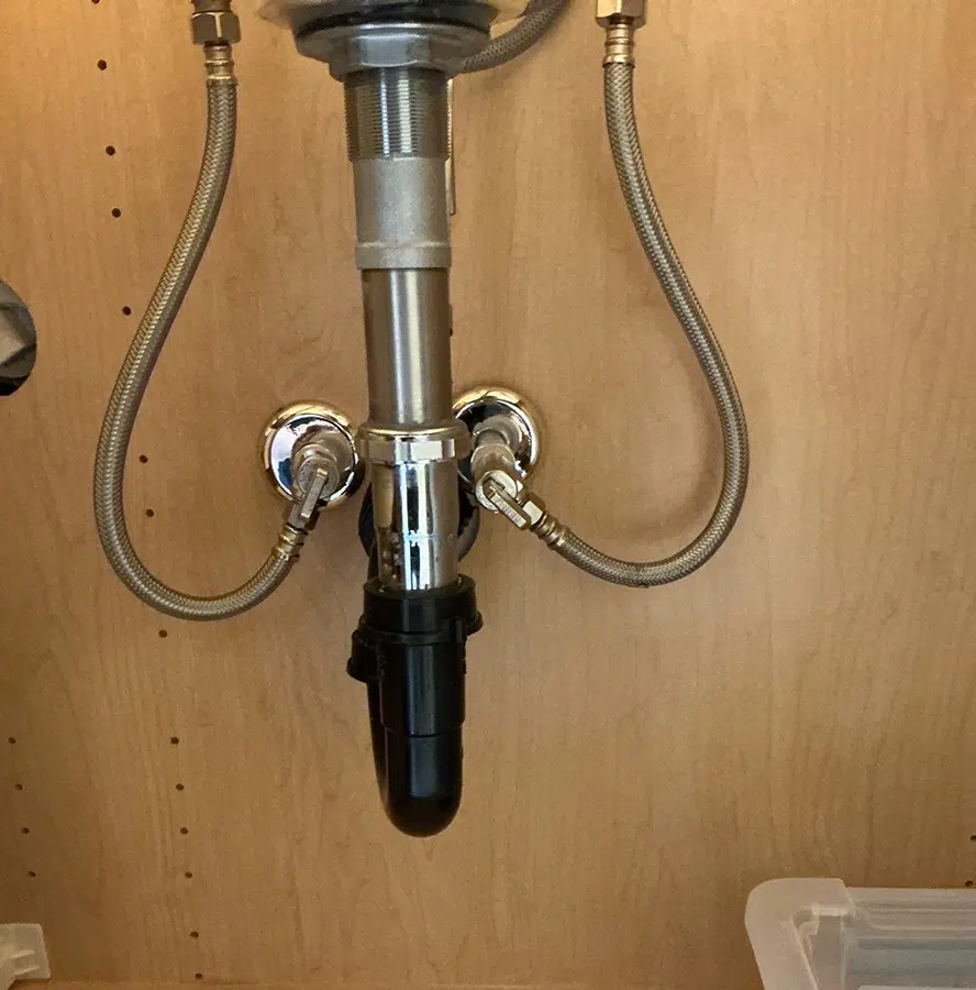 Faucet supply lines repaired under a sink in Pittsburgh, PA